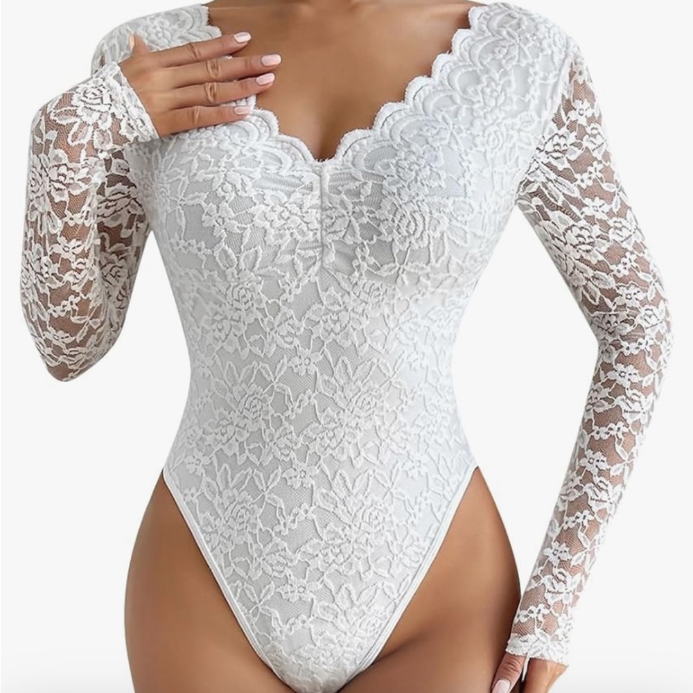 This is a sheer flower white bodysuit (never worn)